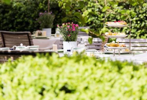 Garten im Hotel Seitner Hof in Pullach im Isartal